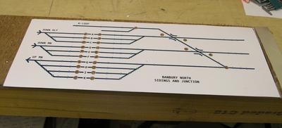/images1014/drilledpaper.thumbnail.jpg